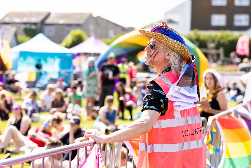 Pride volunteer stewarding pride at St Ives in 2022